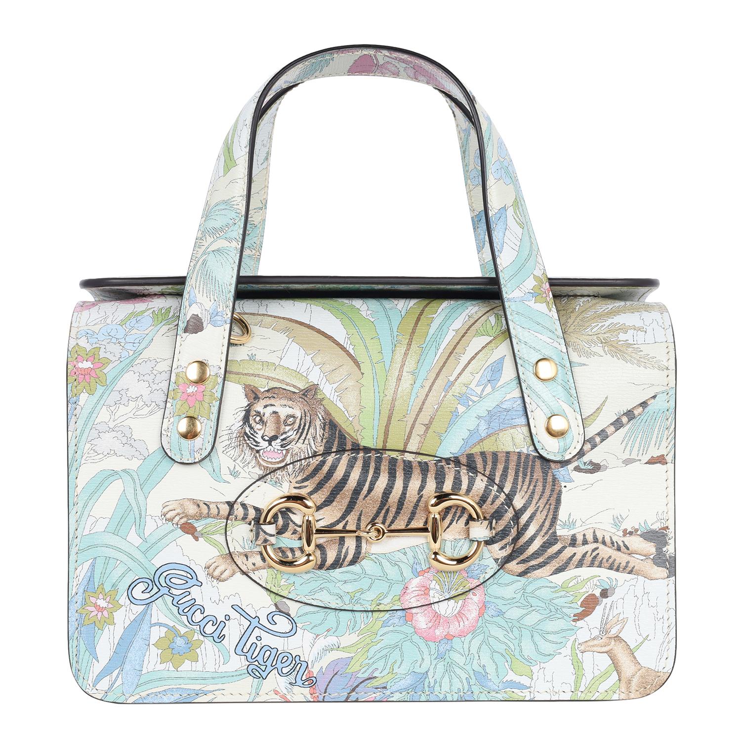 Authentic, NEW Gucci Shangai Calfskin Tiger Savanah Mini Horsebit 1955 Foldover Top Handle Bag. There are many reasons I love this bag; first and foremost is the Tiger and floral print, which is featured on both the front and back of the bag. The