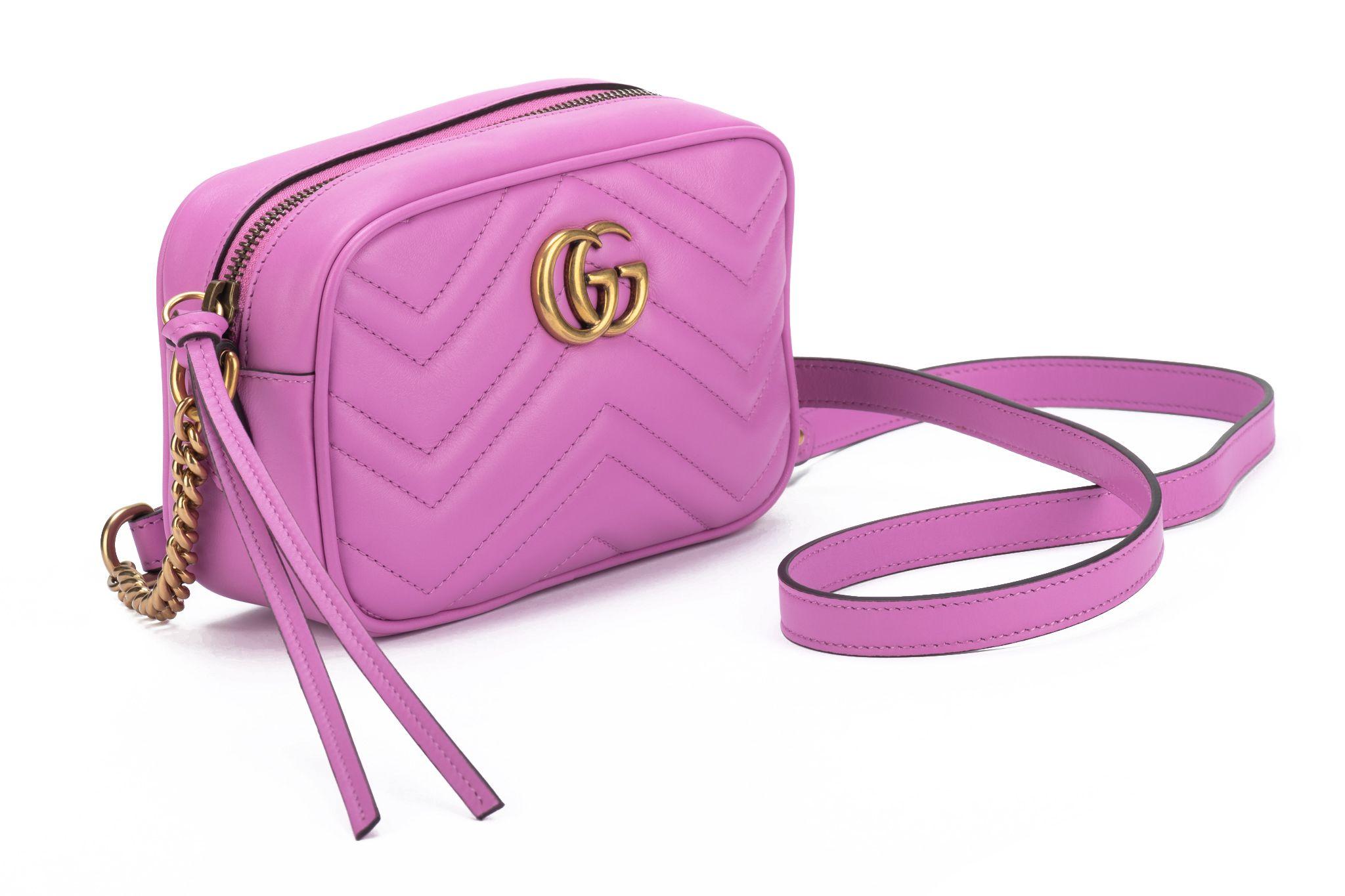 Gucci new lilac leather small Marmont cross body bag with gold tone hardware. Adjustable shoulder strap, drop 23”. Comes with booklet and original dust cover.
