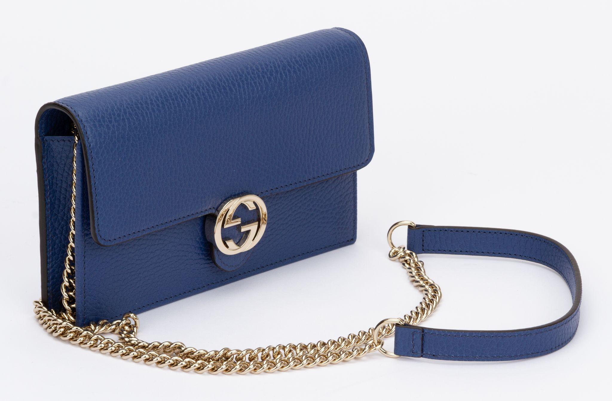 Gucci new in box blue hammered leather cross body bag with light gold tone hardware. Shoulder strap drop 23.5