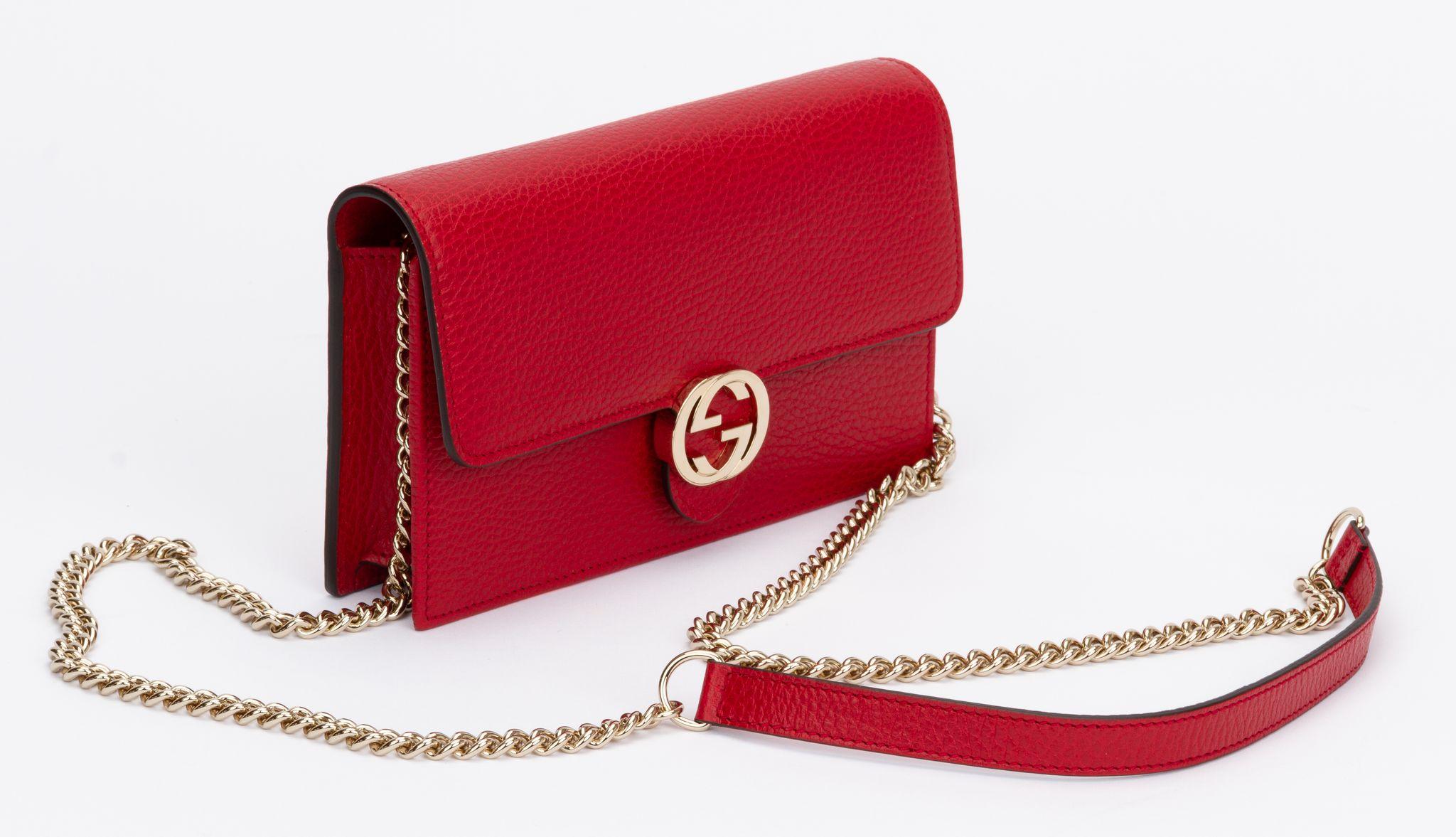 Gucci new in box red hammered leather cross body bag with light gold tone hardware. Shoulder strap drop 23.5