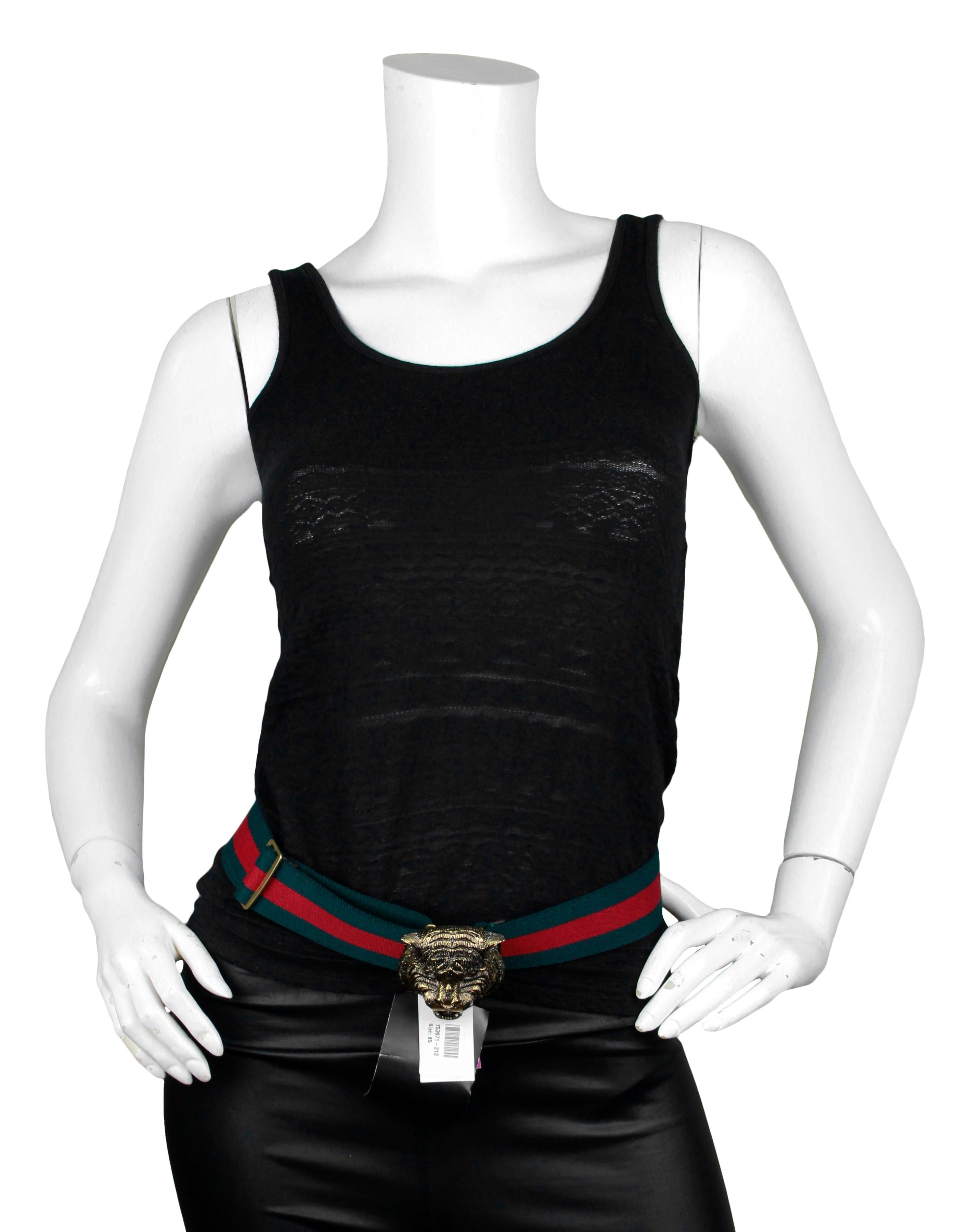 Gucci NWT Green/Red Web Tiger Head Buckle Belt sz 85

Made In: Italy
Color: Green and red
Hardware: Antique goldtone
Materials: Stretch canvas
Closure/Opening: Hook
Overall Condition: New with tags

Marked Size: 85cm/ 34