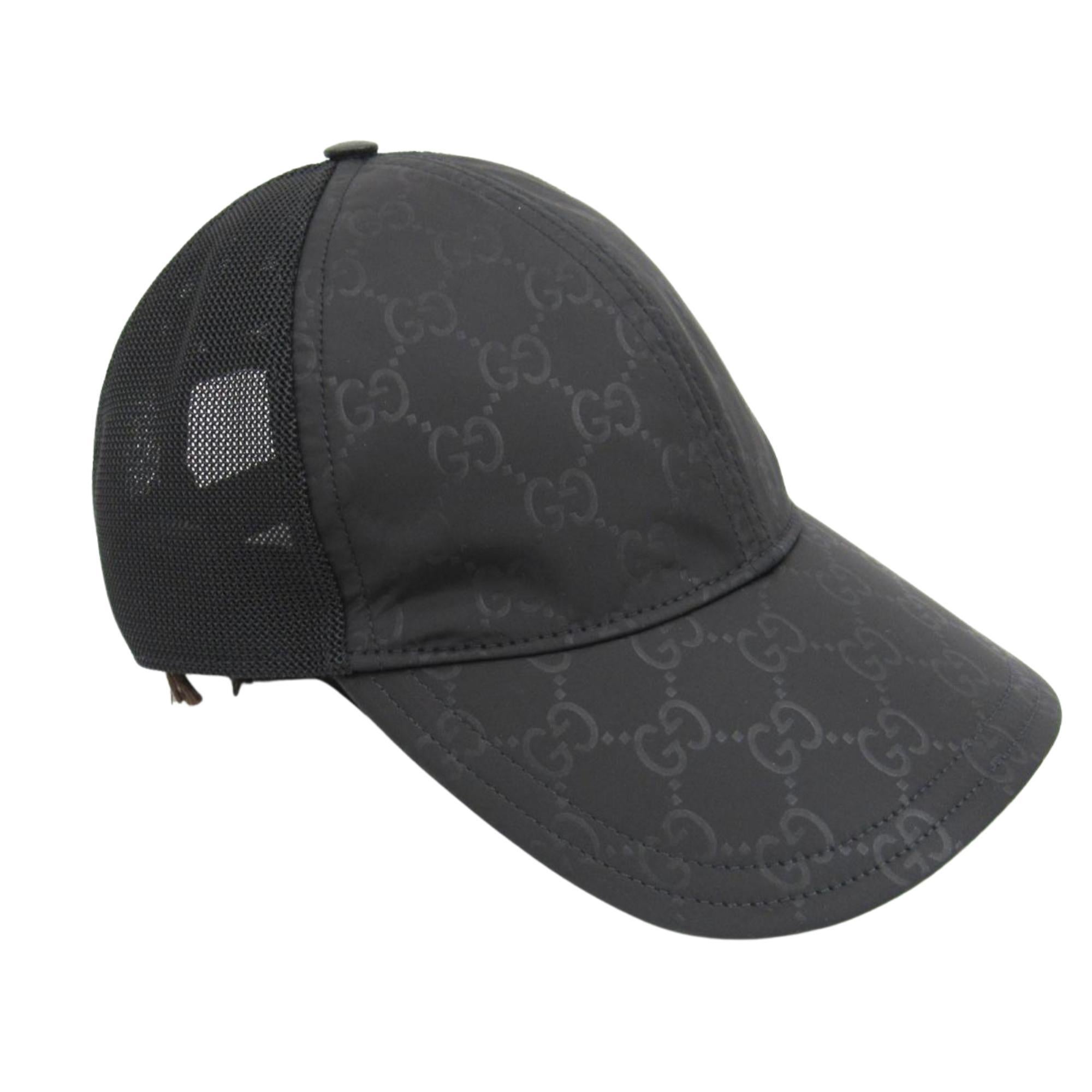 This cap is made of traditional black Gucci GG monogram nylon. The cap features a mesh back and an adjustable closure.

COLOR: Black
MATERIAL: Nylon
ITEM CODE: 510950
SIZE: Small 57 cm 
COMES WITH: Tags
CONDITION: Excellent - faint hairline marks.