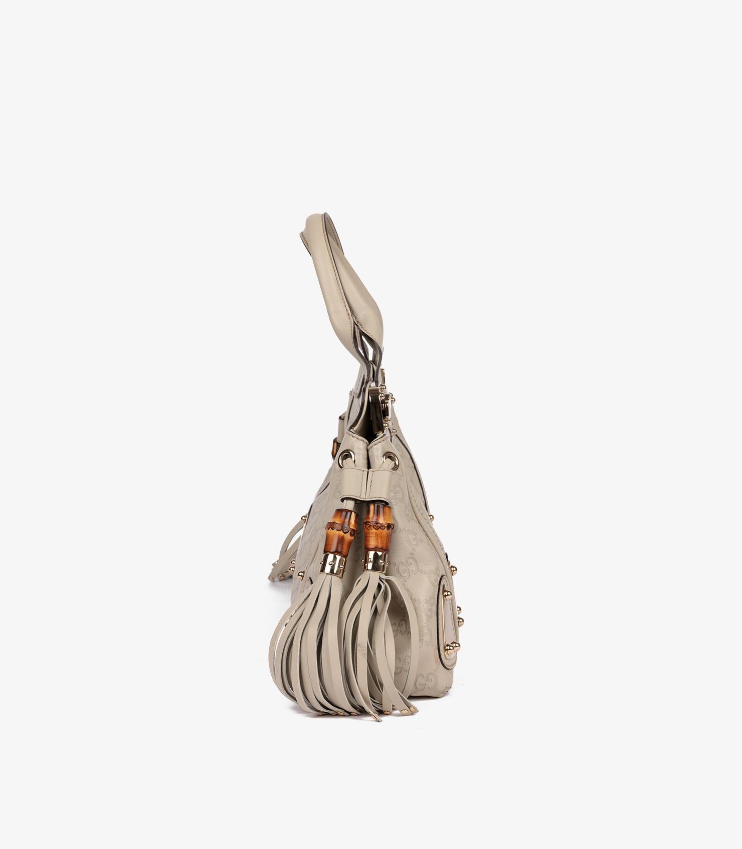 Women's or Men's Gucci Off White GG Embossed Guccissima Leather Medium Tassle Race Tote