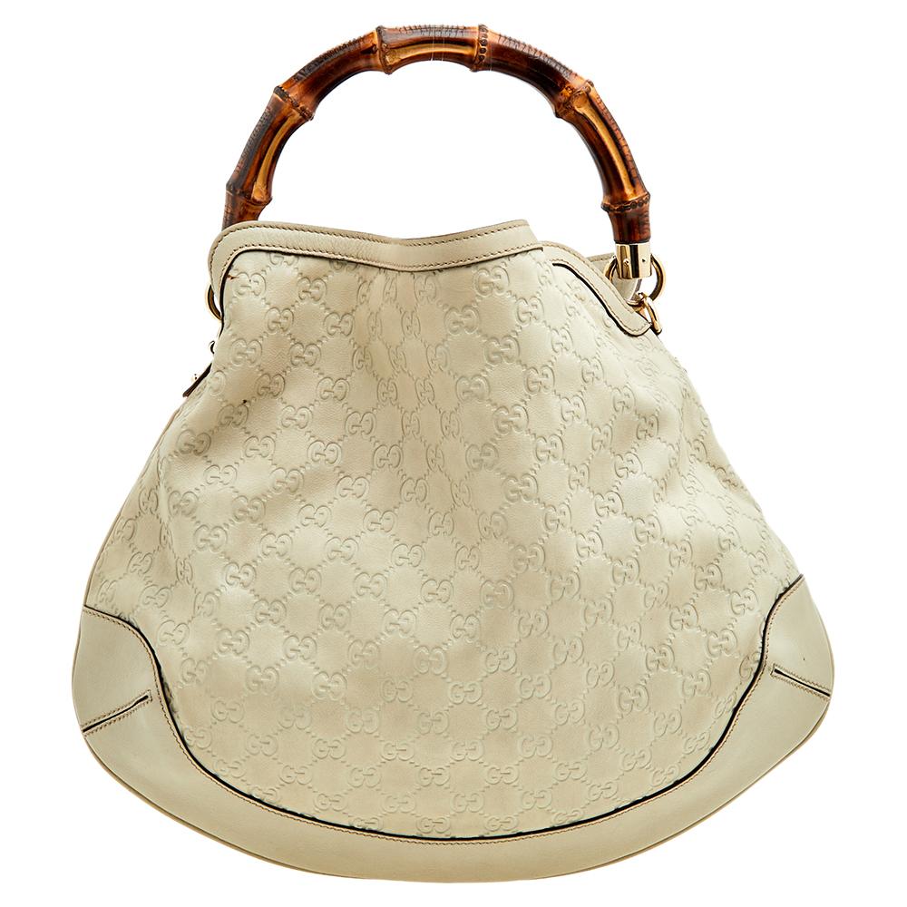 Handbags as fabulous as this one are hard to come by. So, own this gorgeous Gucci Peggy bag today and light up your closet! Crafted from Guccissima leather, this stunning number has a spacious fabric interior and is held by a wonderfully created
