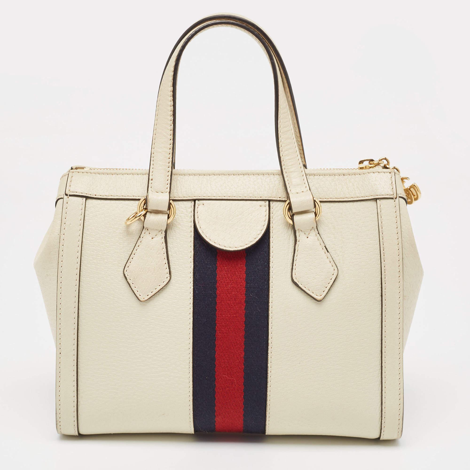 This alluring tote bag for women has been designed to assist you on any day. Convenient to carry and fashionably designed, the tote is cut with skill and sewn into a great shape. It is well-equipped to be a reliable accessory.

Includes: Detachable