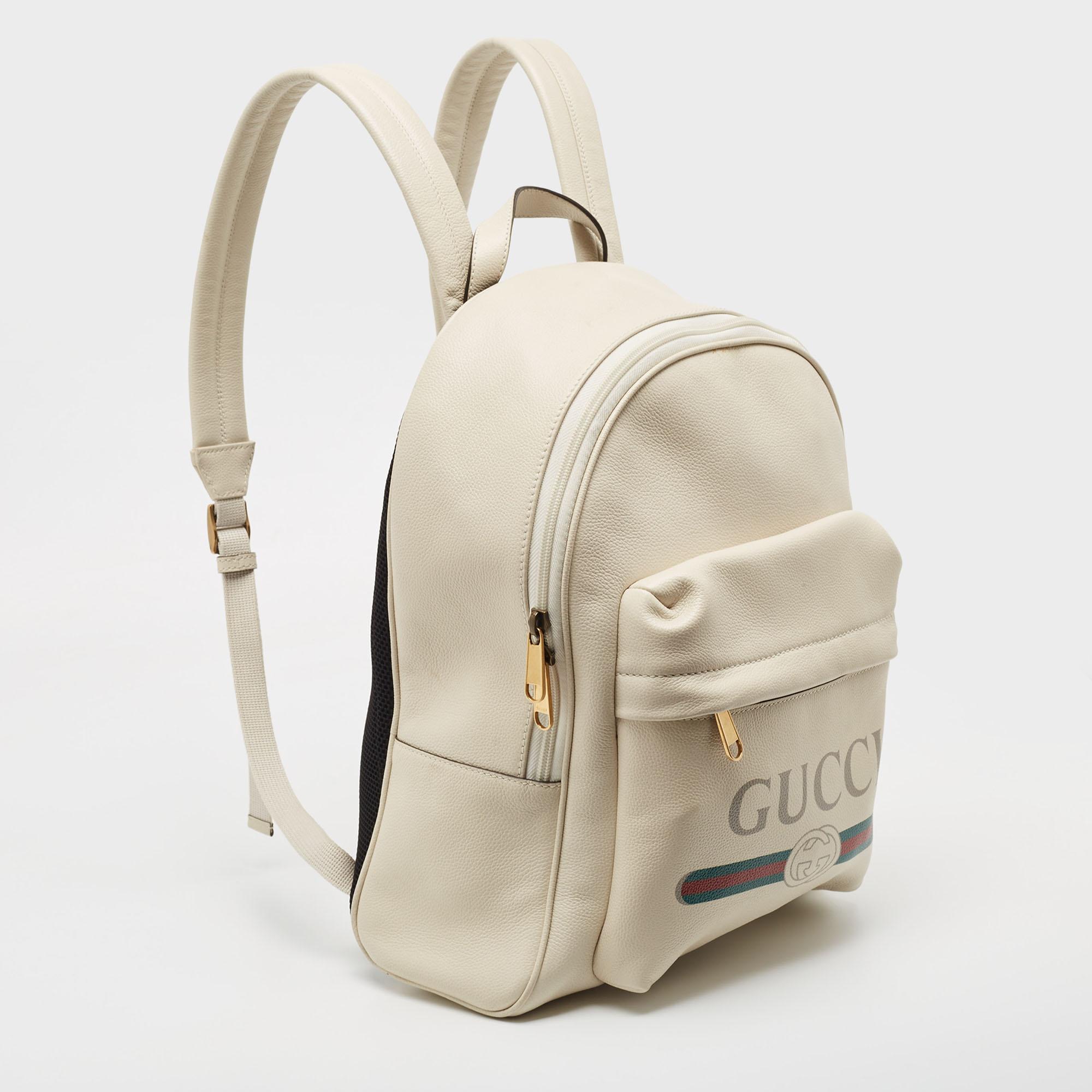 Women's Gucci Off White Leather Vintage Logo Print Backpack