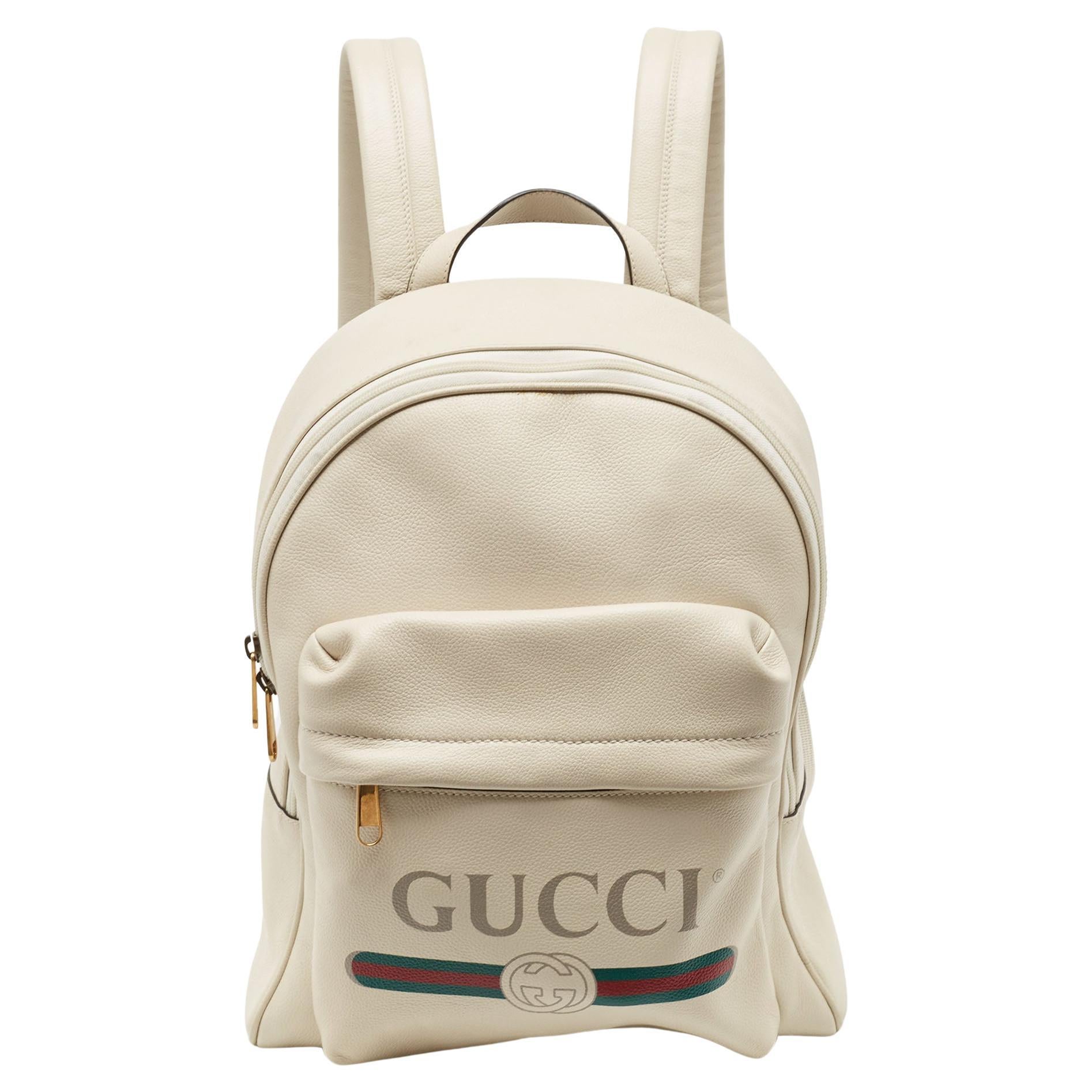 Gucci Off White Leather Vintage Logo Print Backpack