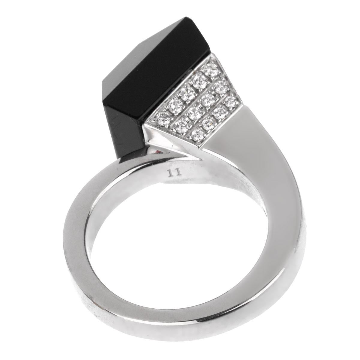 An iconic Gucci diamond ring showcasing a 12mm onyx, followed by round brilliant cut diamonds in 18k white gold. The ring measures a size 5 1/2 and can be resized.