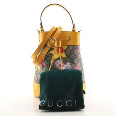 Gucci Ophidia Bucket Bag Flora GG aus beschichtetem Segeltuch und Leder