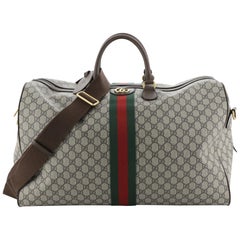 Gucci Ophidia Carry On Duffle GG Coated Canvas Large at 1stDibs | gucci duffle bag, gucci ophidia duffle bag, gucci ophidia travel bag