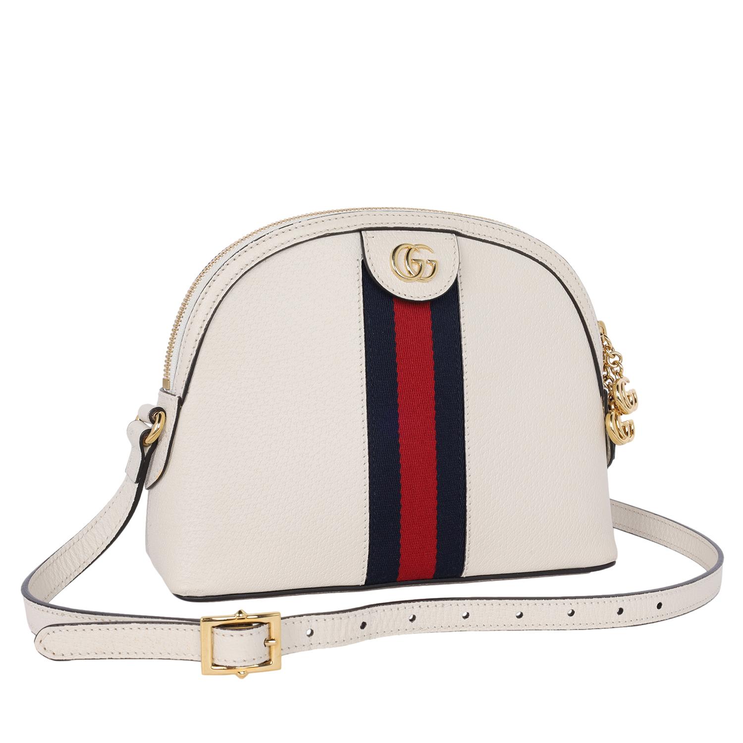 Authentic, pre-owned Gucci GG Ophidia Dome Shoulder Bag Leather in white. This chic handbag features leather in white with supreme blue and red strip, leather shoulder strap, and gold hardware. The zipper top opens to a spacious interior with 3