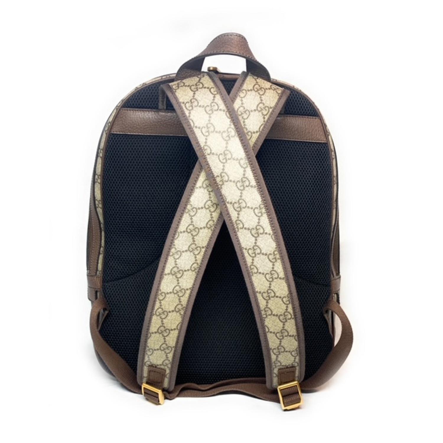 This Gucci Coated Canvas Backpack Bag is great for travel or running errands with ultimate hands-free convenience. The bag features an internal zip pocket with two mini slots. All over pattern placement may vary. One front zip pocket. It has a light