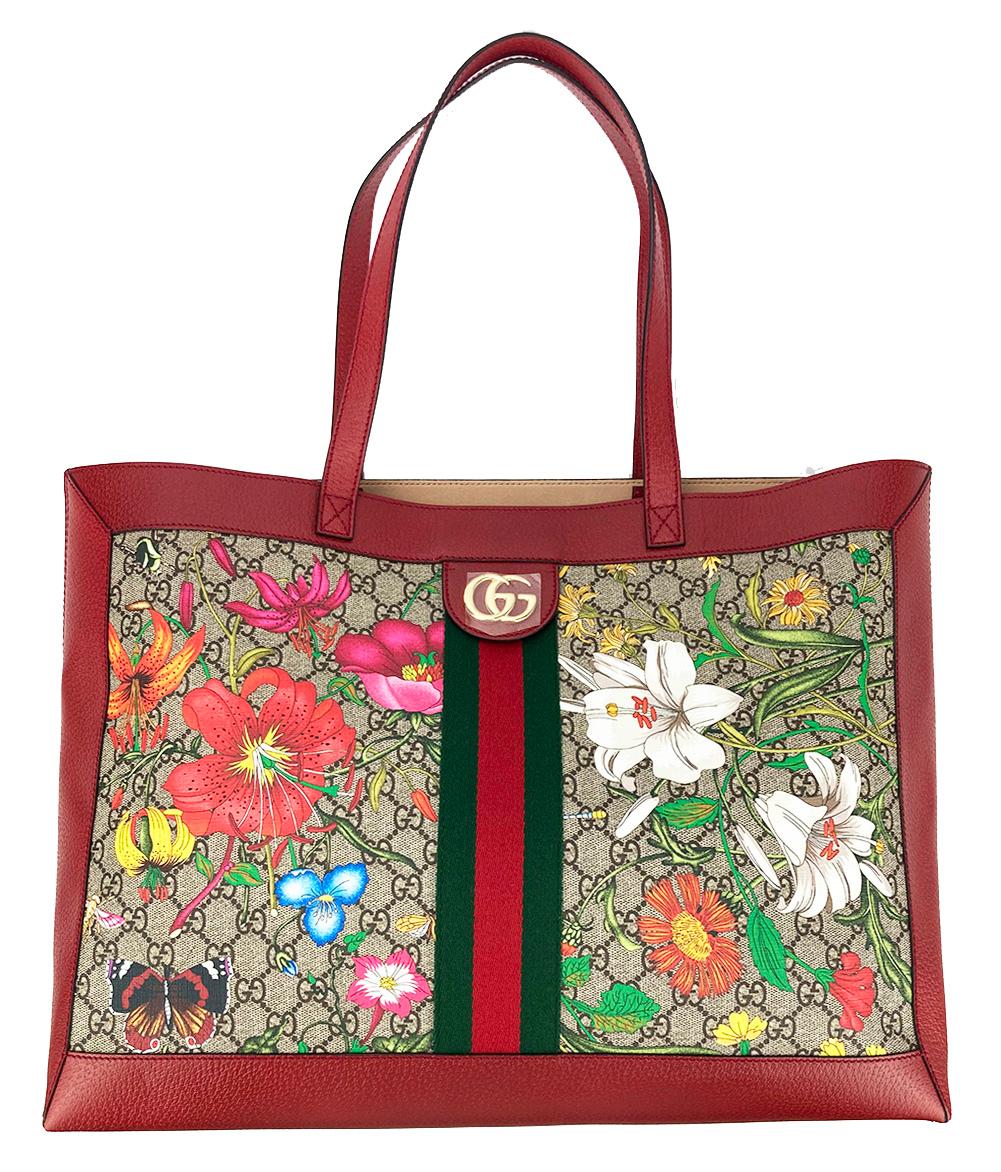 Gucci Ophidia GG Supreme Floral Medium Tote in new unused condition. Signature monogram canvas with multi color floral print, red and green centered canvas stripe, red leather trim and gold hardware. Double shoulder straps to carry or hold