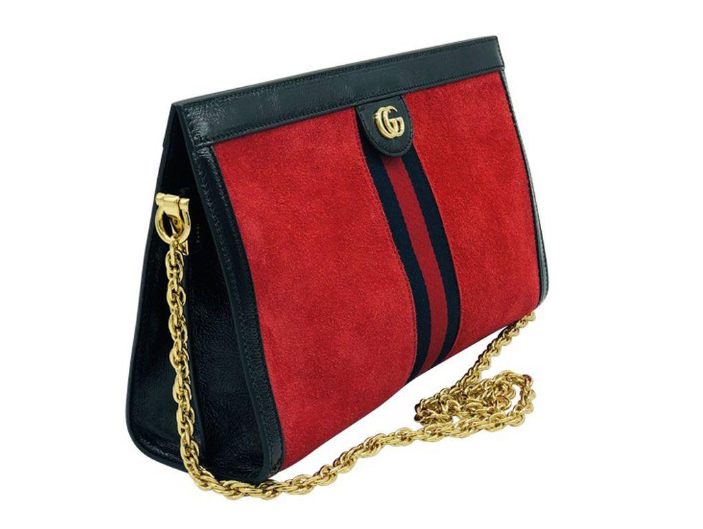 Gorgeous bag by Gucci – the Medium Ophidia bag which can be used as a clutch or shoulder bag. Made from luxurious suede and patent leather with the iconic web detail. Purchased and stored so never used and in new
