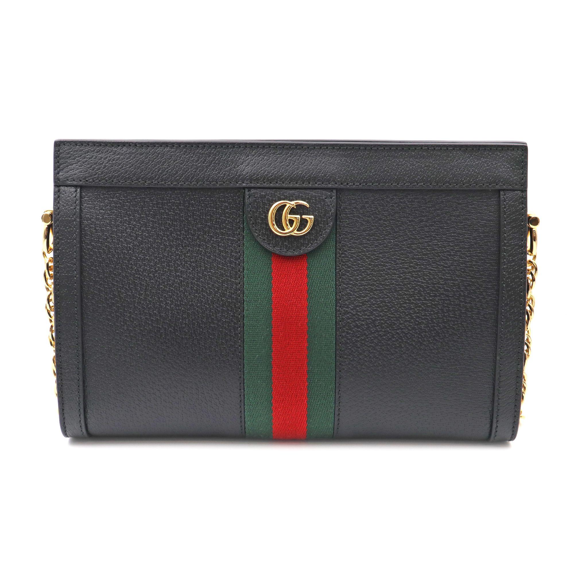 The Guccismall chain Ophidia shoulder bag was introduced in a new iteration for Pre-Fall 2019, crafted from black leather with inlaid green and red Web stripe. The coveted style is defined by small Double G details at the front tab—a contemporary