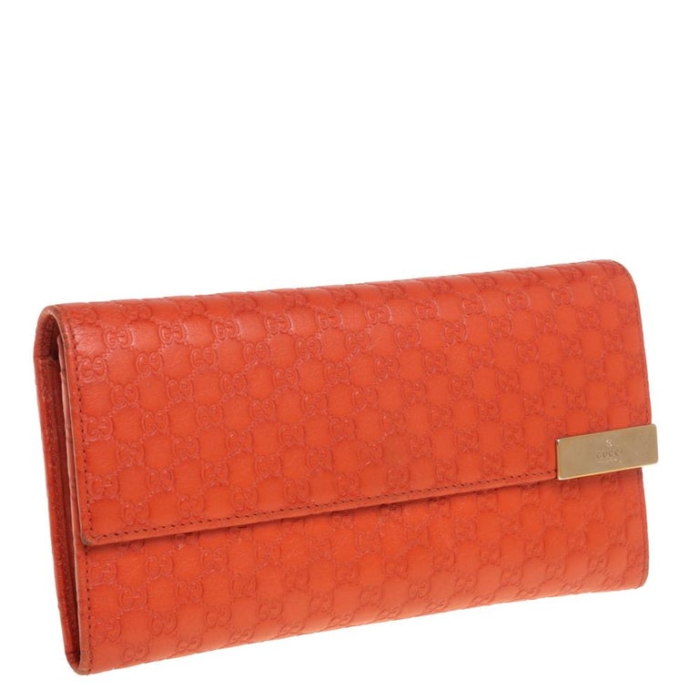 Orangefarbenes Portemonnaie aus Leder von Gucci mit kontinentalem Muster im  Angebot bei 1stDibs