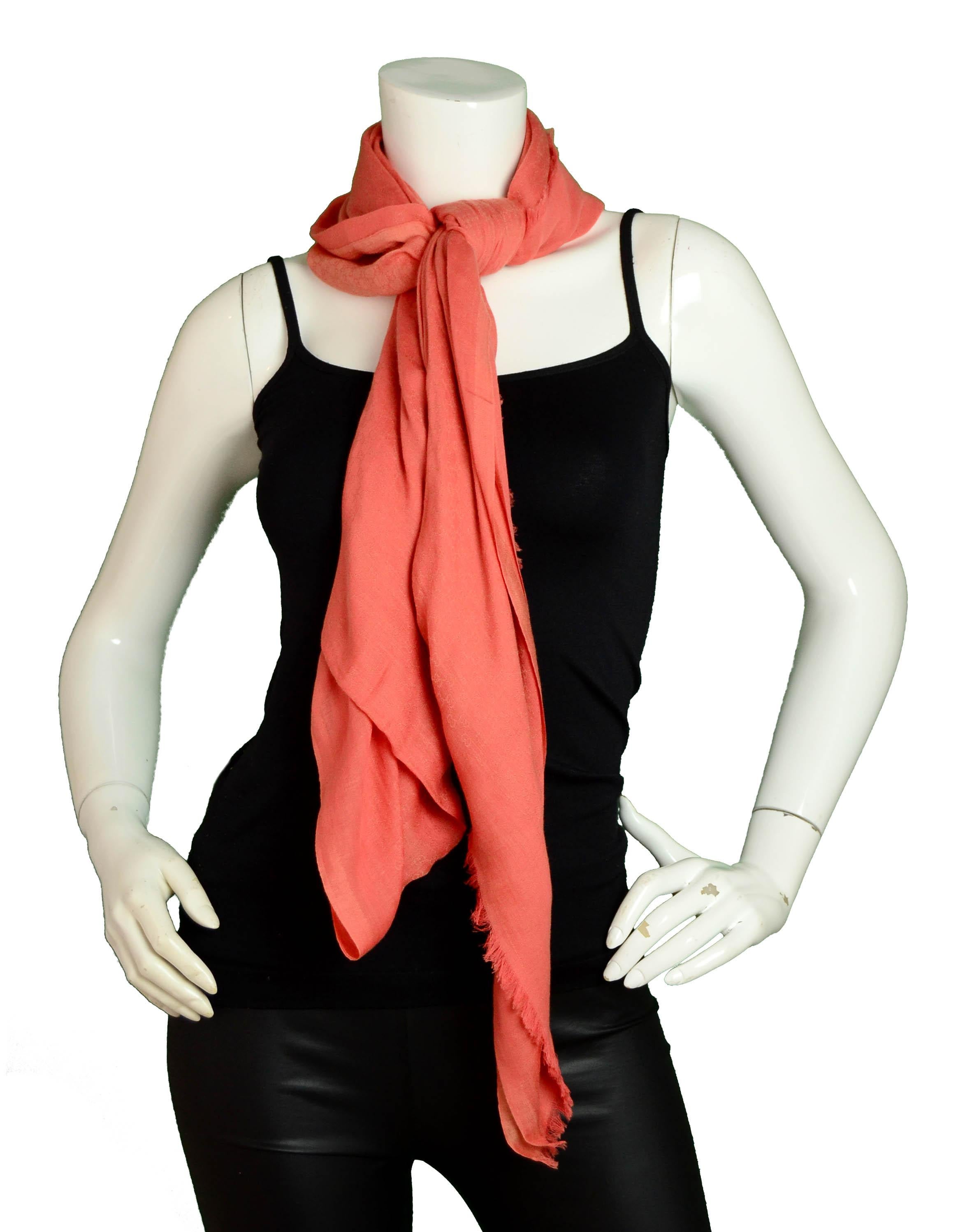 Gucci Orange Mini Monogram Scarf/Shawl

Made In: Italy
Color: Orange
Materials: 53% Cotton, 40% Modal, 7% Cashmere
Overall Condition: Excellent

Measurements:
79”L x 43”W
