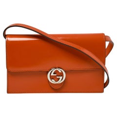 Gucci Orange Patent Leather Interlocking G Flap Clutch Bag