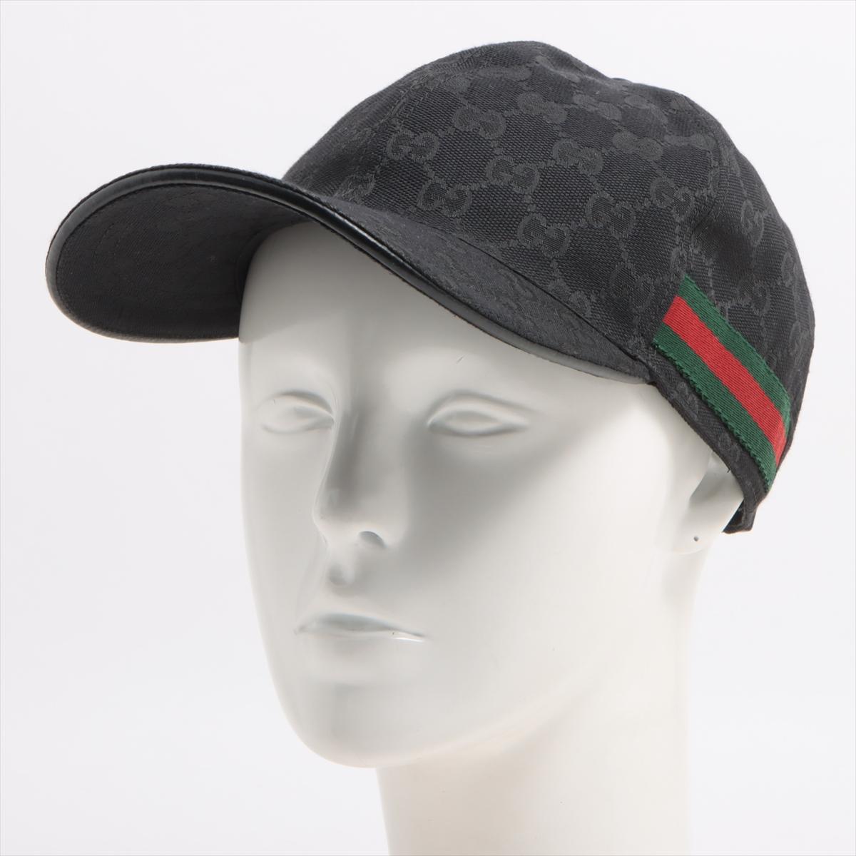 The Gucci Original GG Canvas Baseball Hat with Web in Black is a stylish and iconic accessory that combines luxury and sporty elegance. Crafted from durable canvas featuring the classic GG monogram print, the hat exudes sophistication. The black