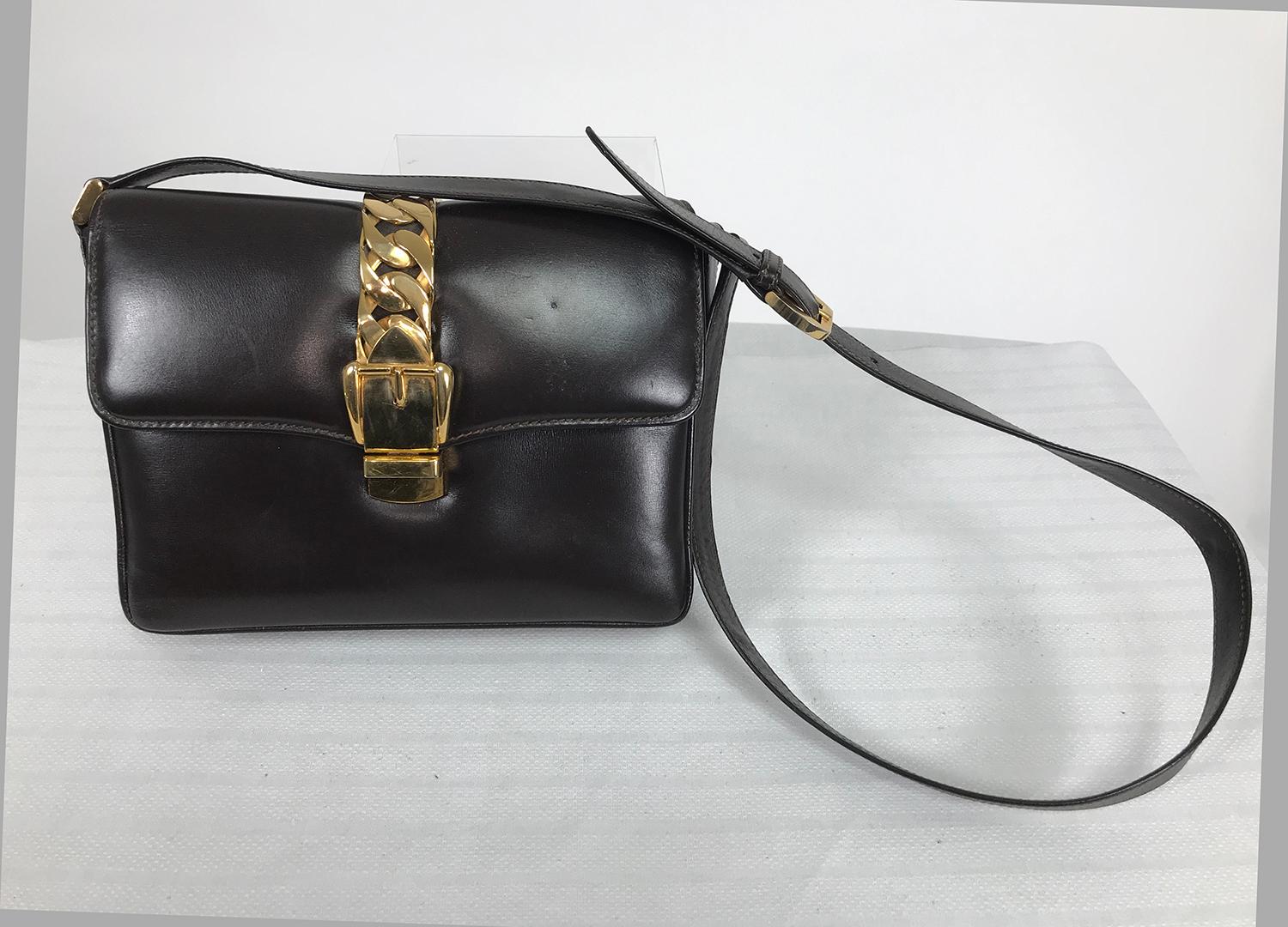 Gucci original Sylvie shoulder bag from 1969, in chocolate brown leather with gold hardware. The archival inspiration for Gucci's 2019 Sylvie 1969 handbag. This bag is in remarkably good condition for it's age, the smooth leather has a beautiful