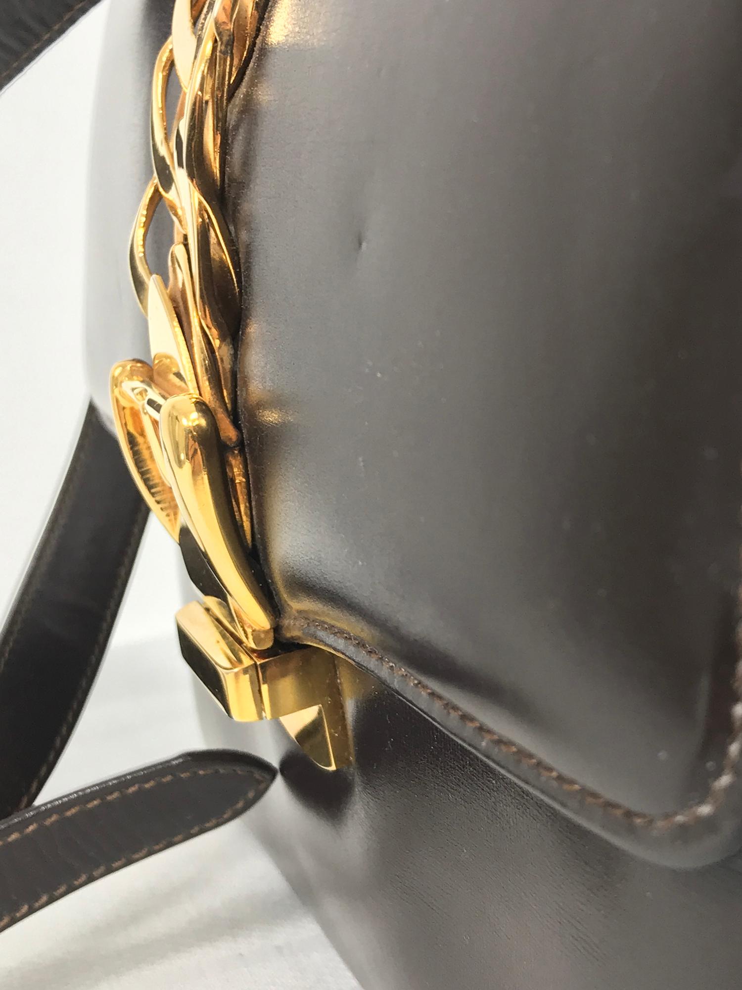 Gucci - Sac porté épaule original Sylvie en cuir brun chocolat et accessoires dorés, 1969 en vente 1