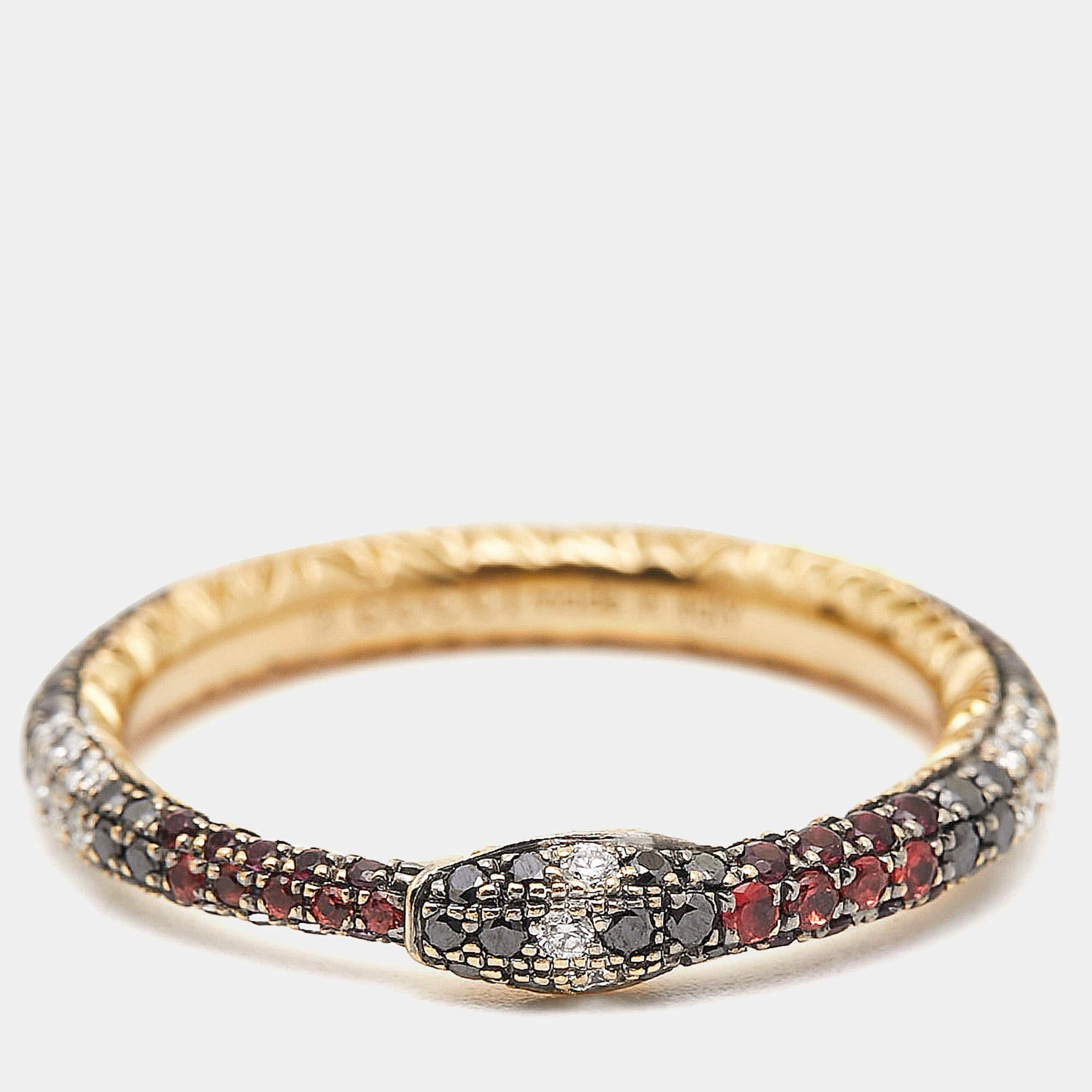 The Gucci Ouroboros ring is an exquisite and luxurious piece of jewelry. Crafted from gleaming 18k yellow gold the ring features a captivating Ouroboros serpent design encrusted with an array of brilliant gemstones adding a burst of colors to its