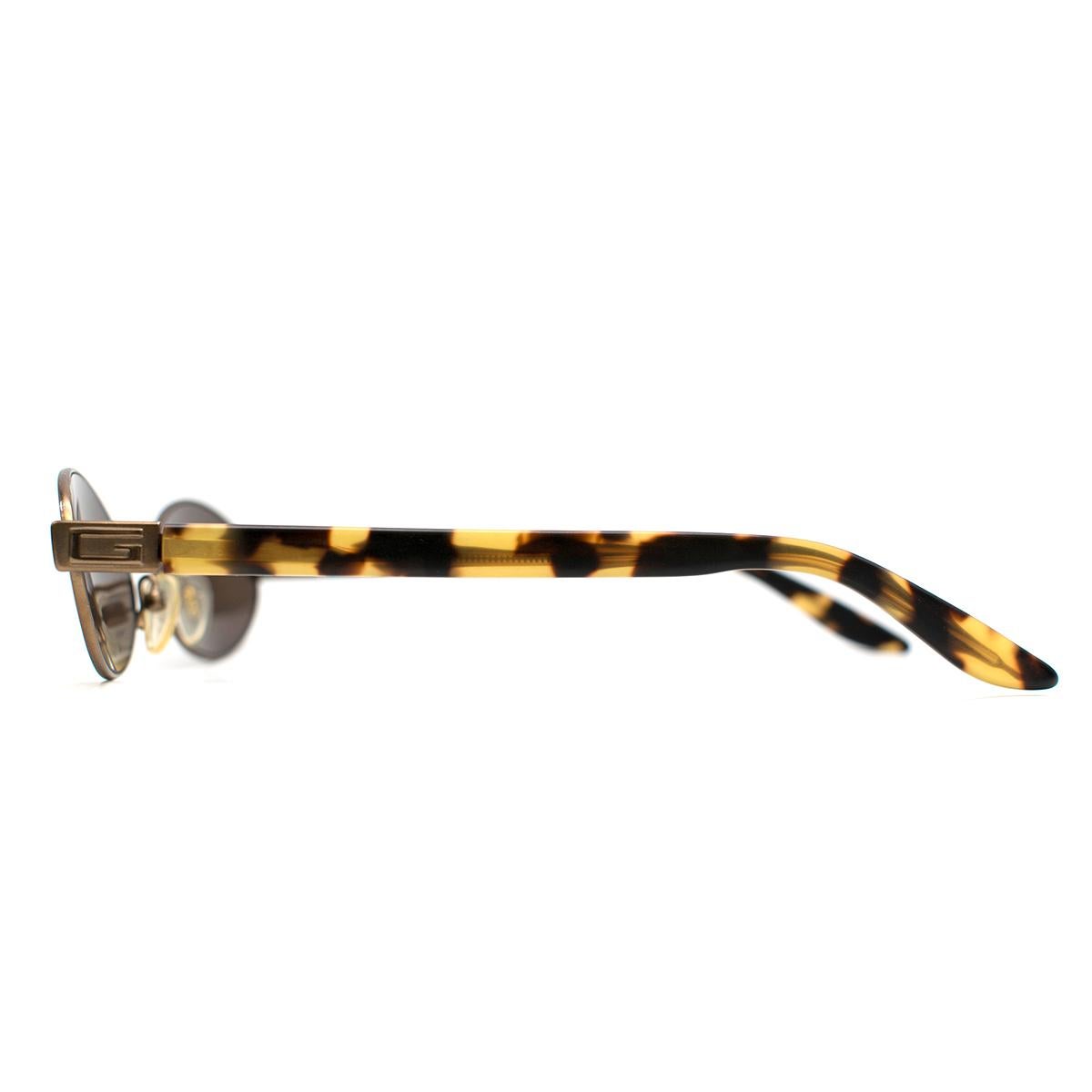 Gray Gucci Oval Tortoise Shell Sunglasses