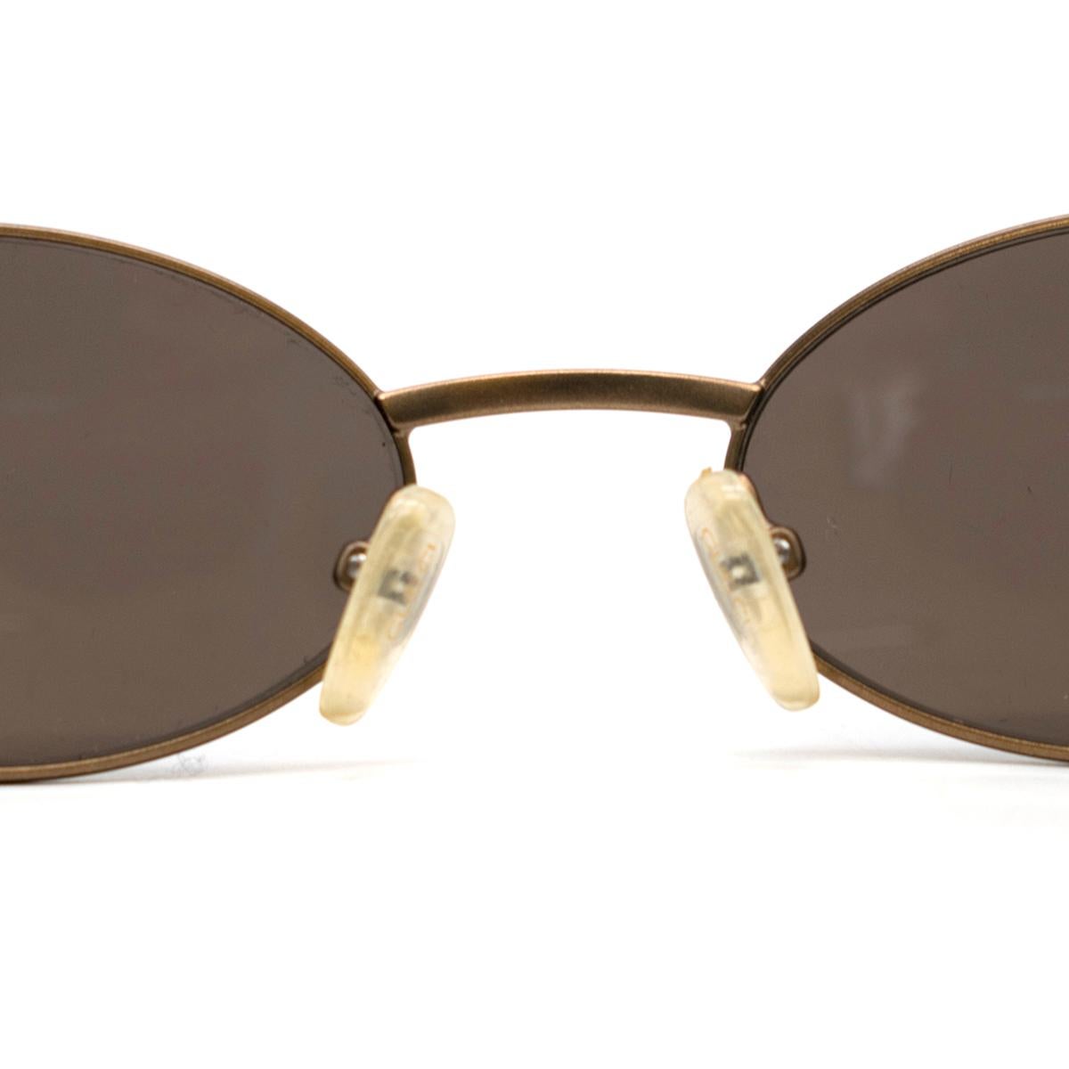 Gucci Oval Tortoise Shell Sunglasses 1