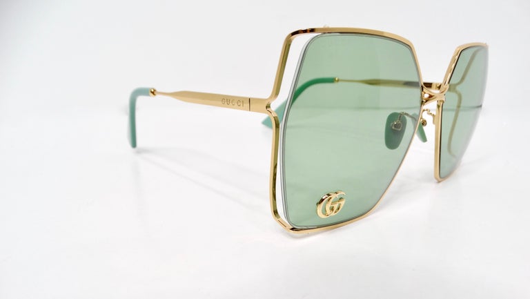 Gucci Oversized Green With Gold-Tone Metal Frame GG Logo  display picture 1