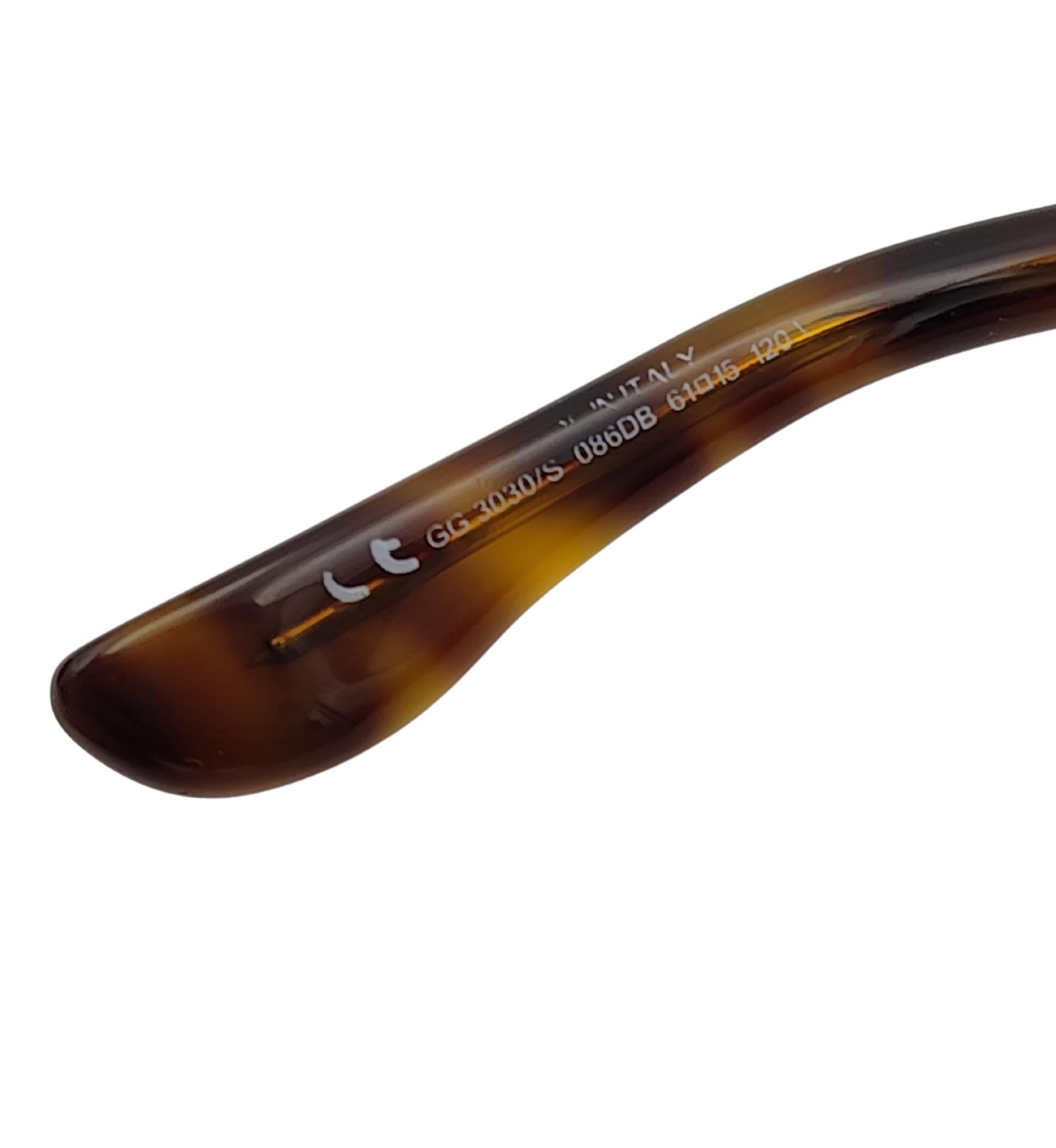 Gafas de sol Gucci oversize con logotipo redondo y estampado marrón en venta 7