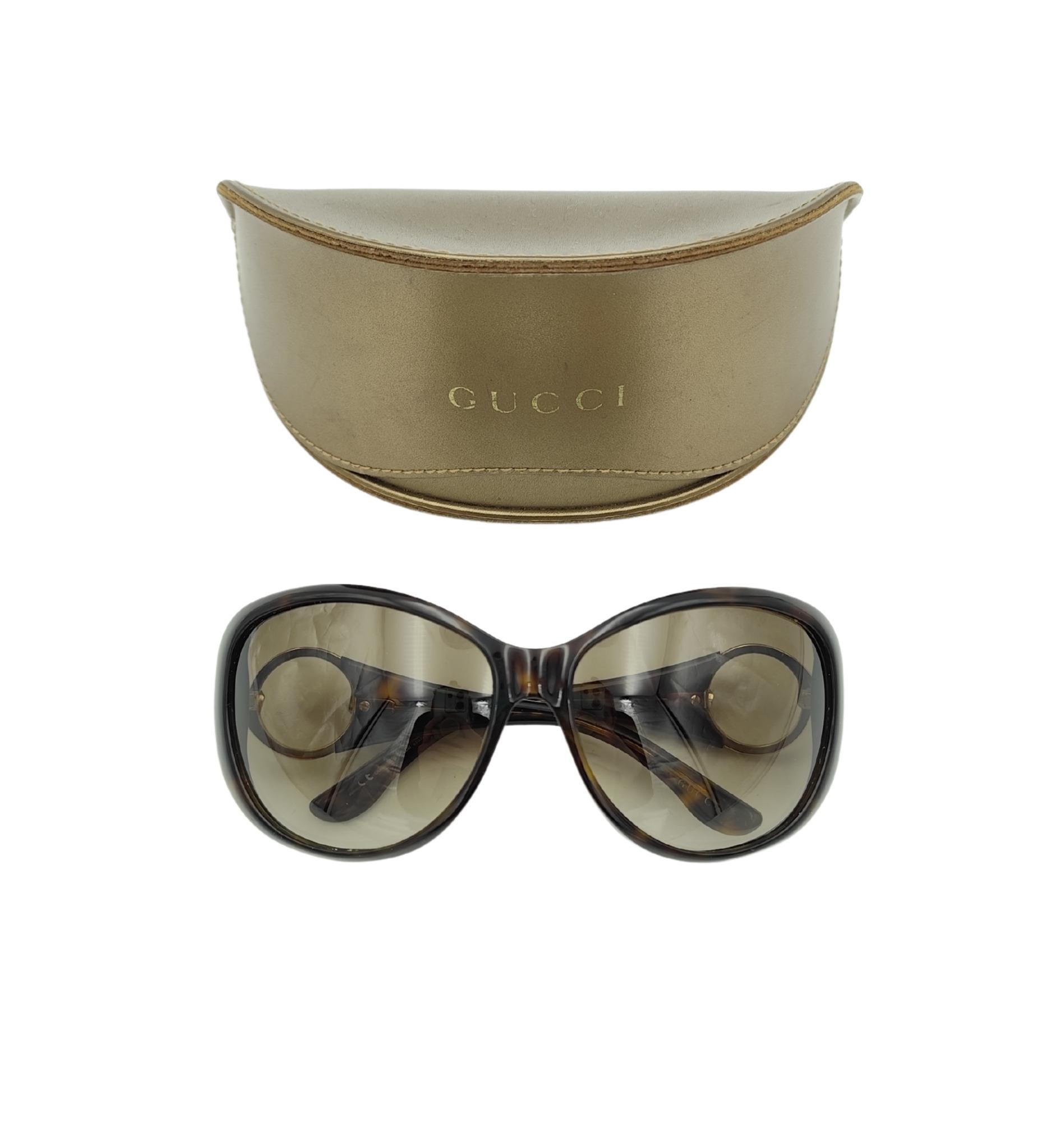 Gafas de sol Gucci oversize con logotipo redondo y estampado marrón Gris en venta