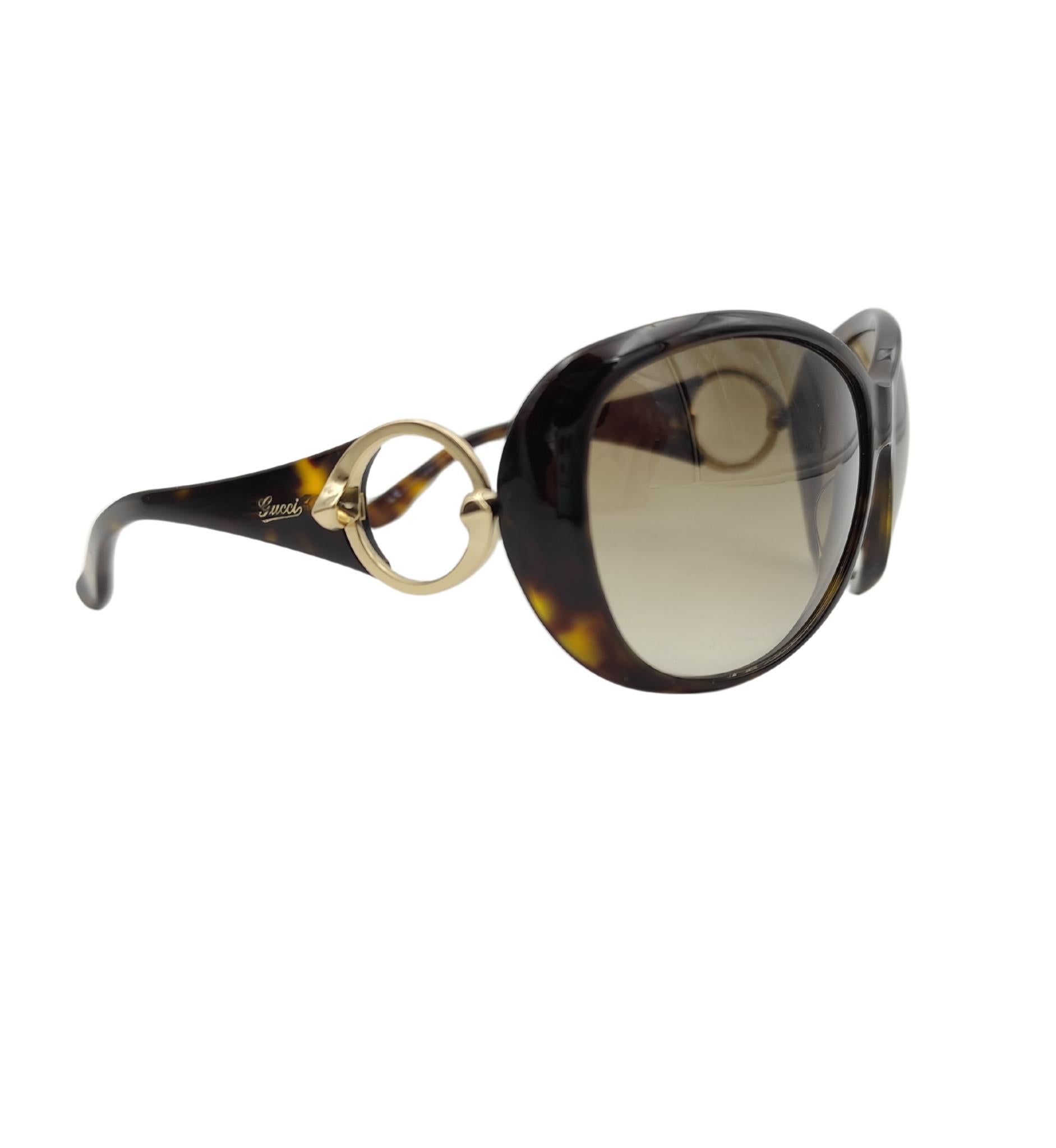 Gafas de sol Gucci oversize con logotipo redondo y estampado marrón en venta 1