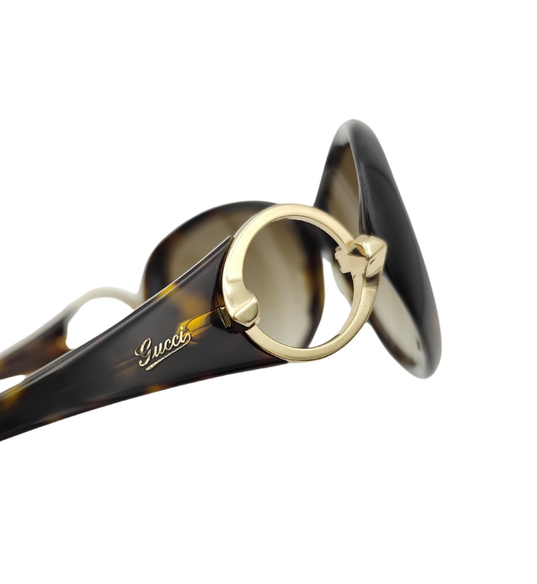 Gafas de sol Gucci oversize con logotipo redondo y estampado marrón en venta 2