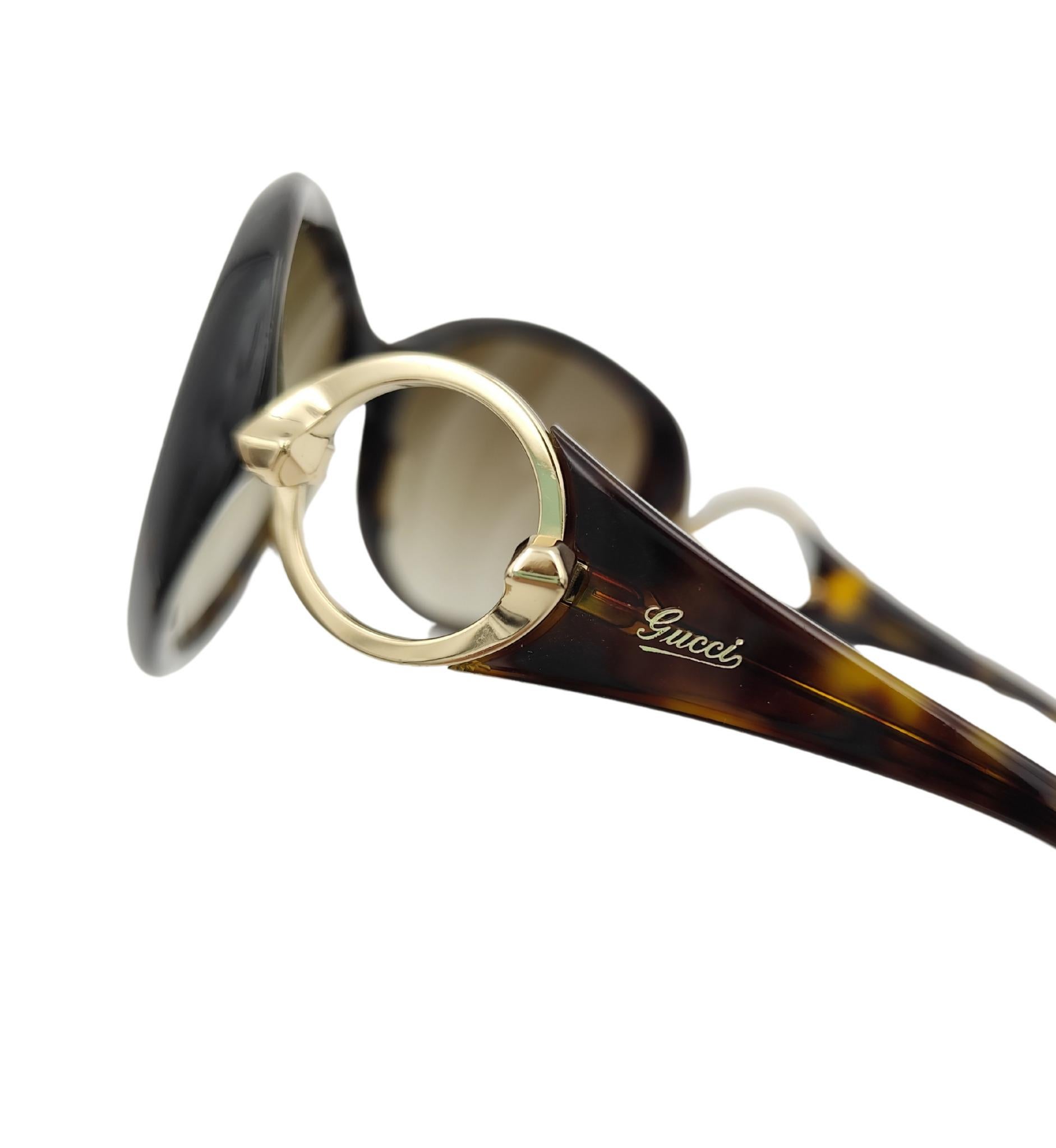 Gafas de sol Gucci oversize con logotipo redondo y estampado marrón en venta 3