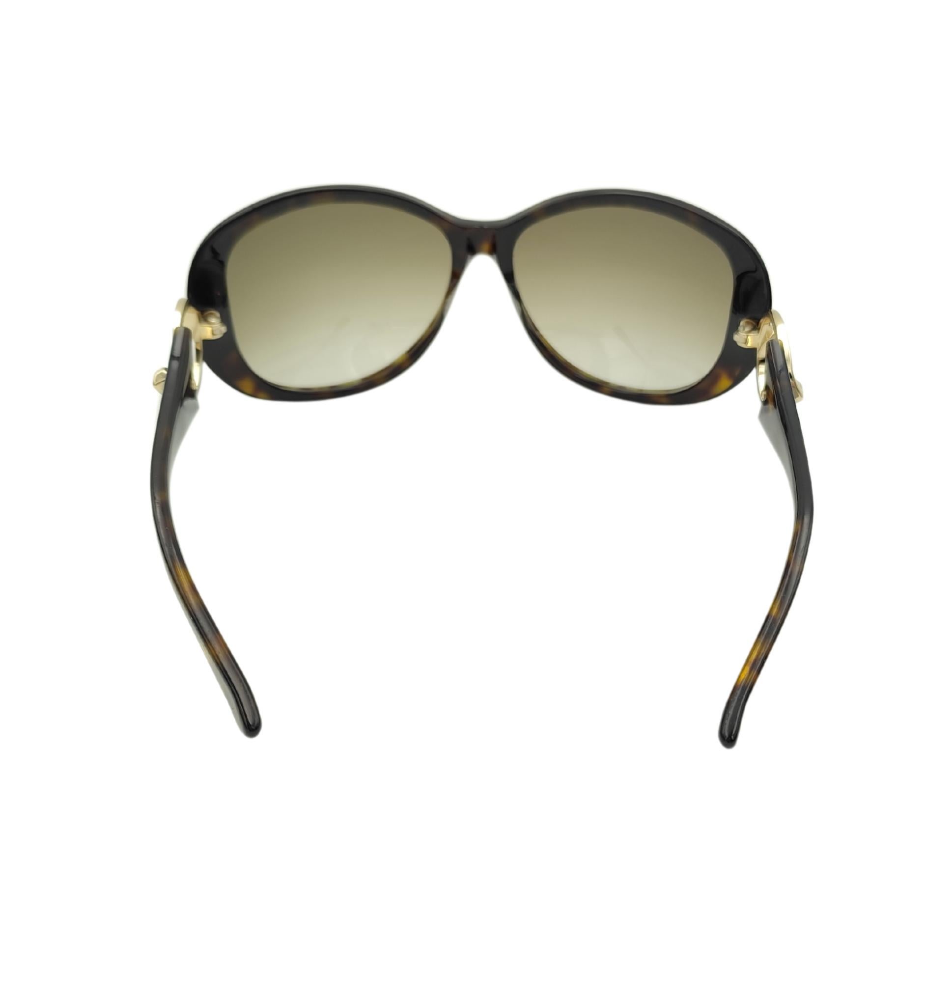 Gafas de sol Gucci oversize con logotipo redondo y estampado marrón en venta 4