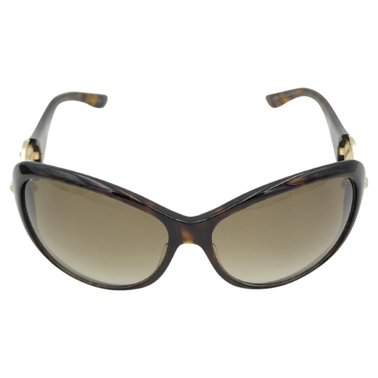 Gafas de sol Gucci oversize con logotipo redondo y estampado marrón
