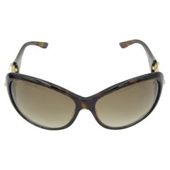 Gucci Sonnenbrille mit rundem Logo in Übergröße und braunem Print