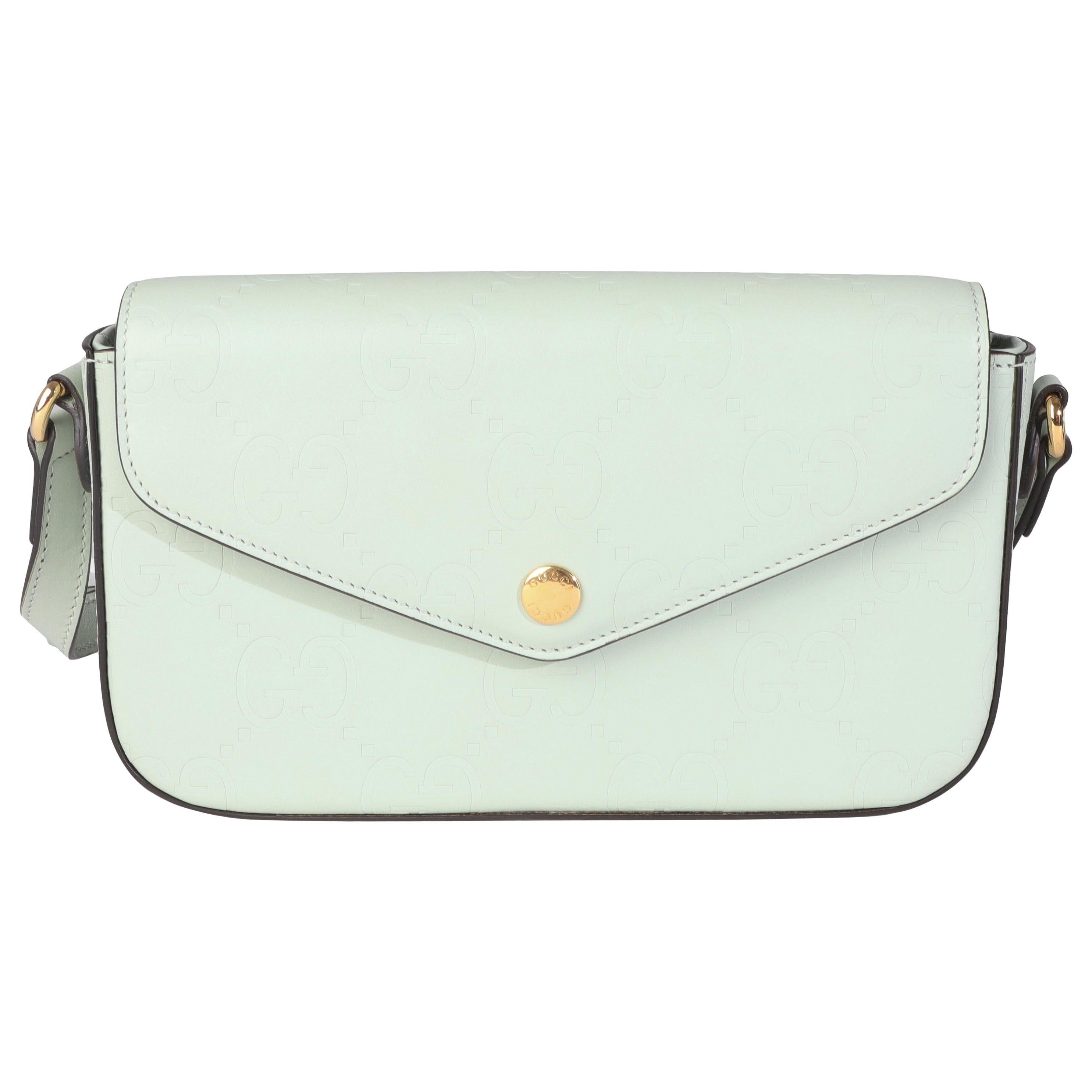 Sac à bandoulière GG Super Mini en cuir de veau vert pâle de Gucci