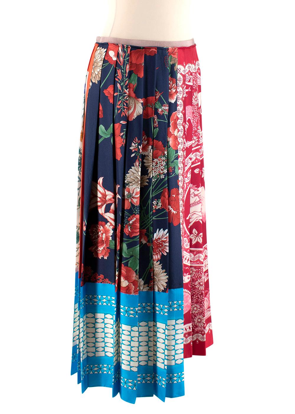 Gucci Patchwork Print Pleated Asymmetric Silk Skirt

- Made of luxurious soft silk 
- Pleated texture 
- Gorgeous scarf patchwork motif 
- Snap fastening 
- Timeless versatile design 

Materials:
100% silk 

Made in Italy 

PLEASE NOTE, THESE ITEMS