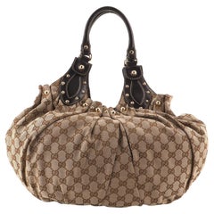 Gucci - Sac à bandoulière Pelham clouté GG Canvas Moyen
