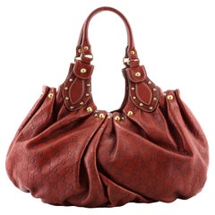 Gucci - Sac à bandoulière Pelham clouté en cuir Guccissima - Taille Medium