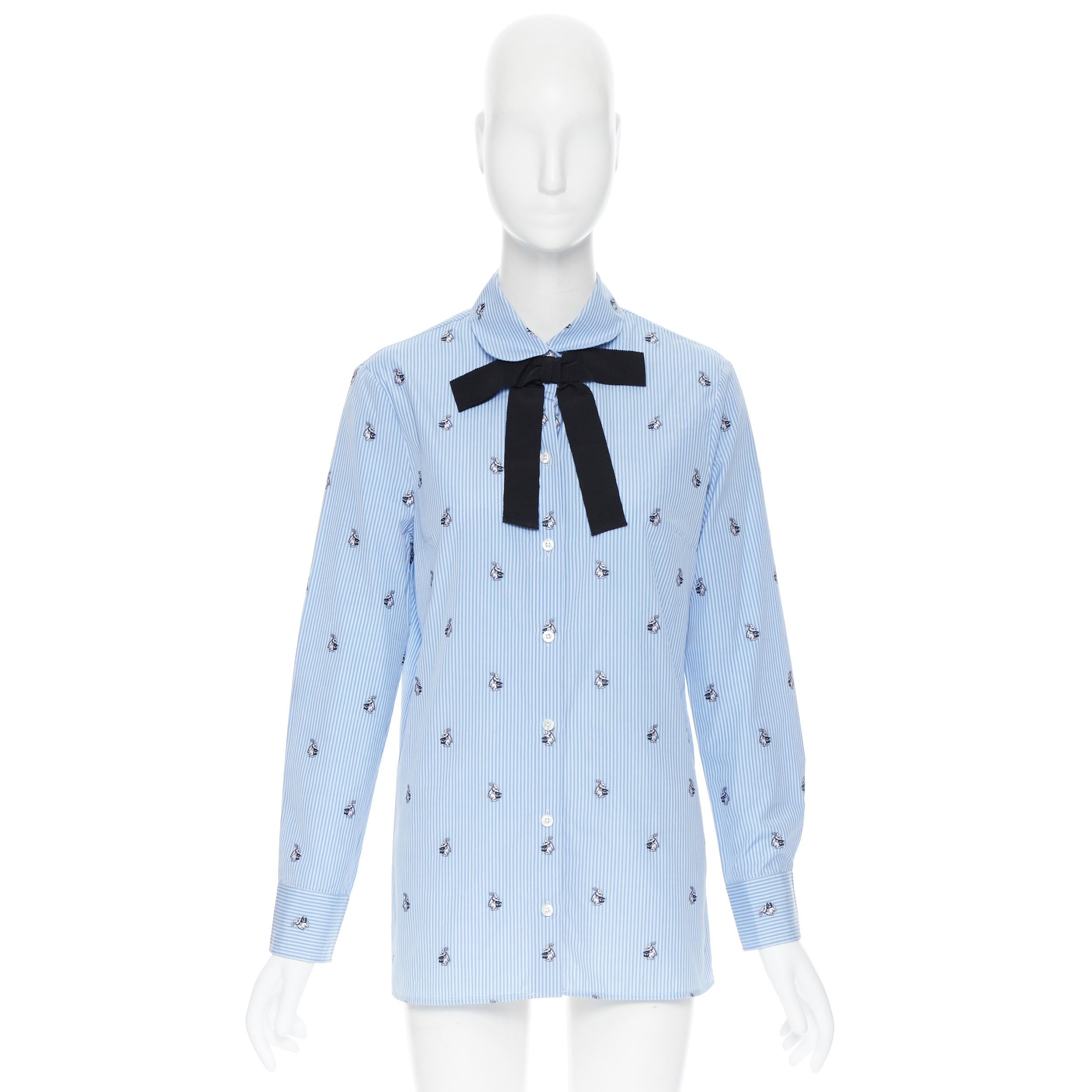 GUCCI Peter Rabbit blue white striped print grosgrain bow long sleeve shirt IT42
Brand: Gucci
Collection: Peter Rabbit collection
Model Name / Style: Cotton shirt
Material: Cotton
Color: Blue
Pattern: Striped
Closure: Button
Extra Detail: Rounded