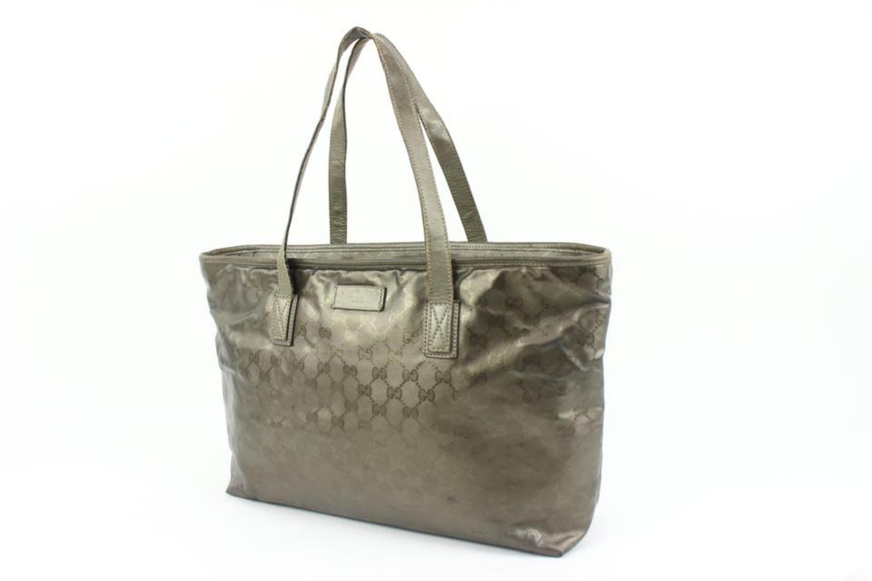 Gucci Pewter Silver Imprime Monogram Medium Zippered Shopping Tote 12g419s
Date Code/Serial Number: 211137 492174
Made In: Italy
Measurements: Length:  18