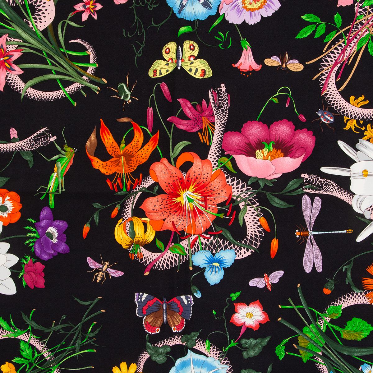 100% authentic  Gucci flora and snake printed scarf in pale rose and black silk (100%) featuring a stunning array of colorful flowers intertwined with coiling snakes-a symbol that has been established as one of Alessandro Michele's signature