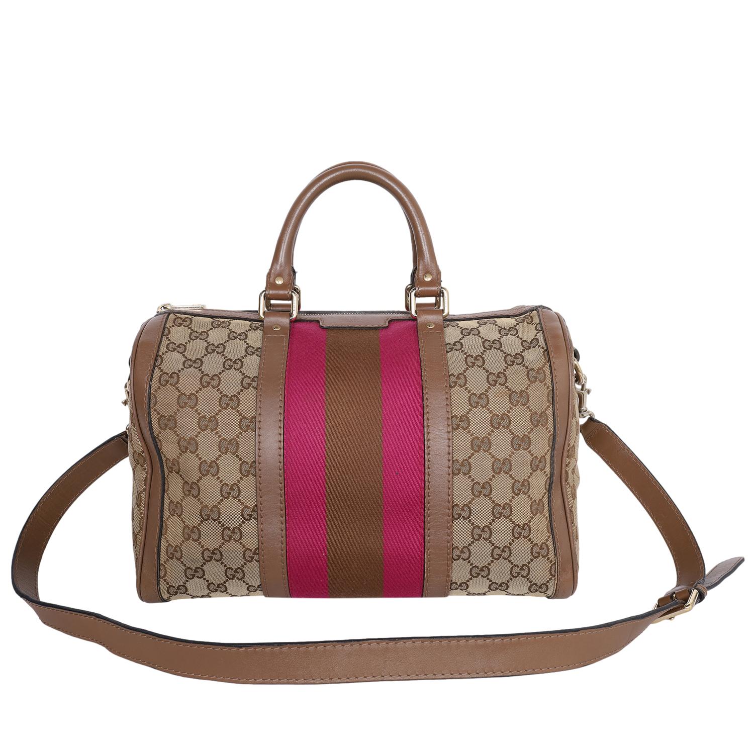 Authentic, pre-owned Gucci web Boston GG canvas leather cross body bag. This classic Gucci cross body bag makes a perfect everyday bag. Features GG with pink, brown and pink web stripe, zipper top closure, roomy interior with 2 slip pocket. This