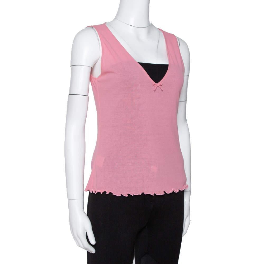 Gucci's top is a pretty collision of style, beautiful detailing, and comfortable fit. The pink top features a V neckline and a feminine charm. Wear this with denim and wedge heels for a casual ensemble.