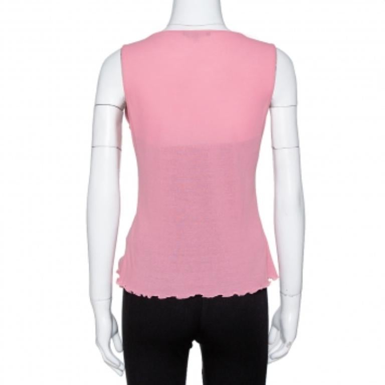 Gucci's top is a pretty collision of style, beautiful detailing, and comfortable fit. The pink top features a V neckline and a feminine charm. Wear this with denim and wedge heels for a casual ensemble.