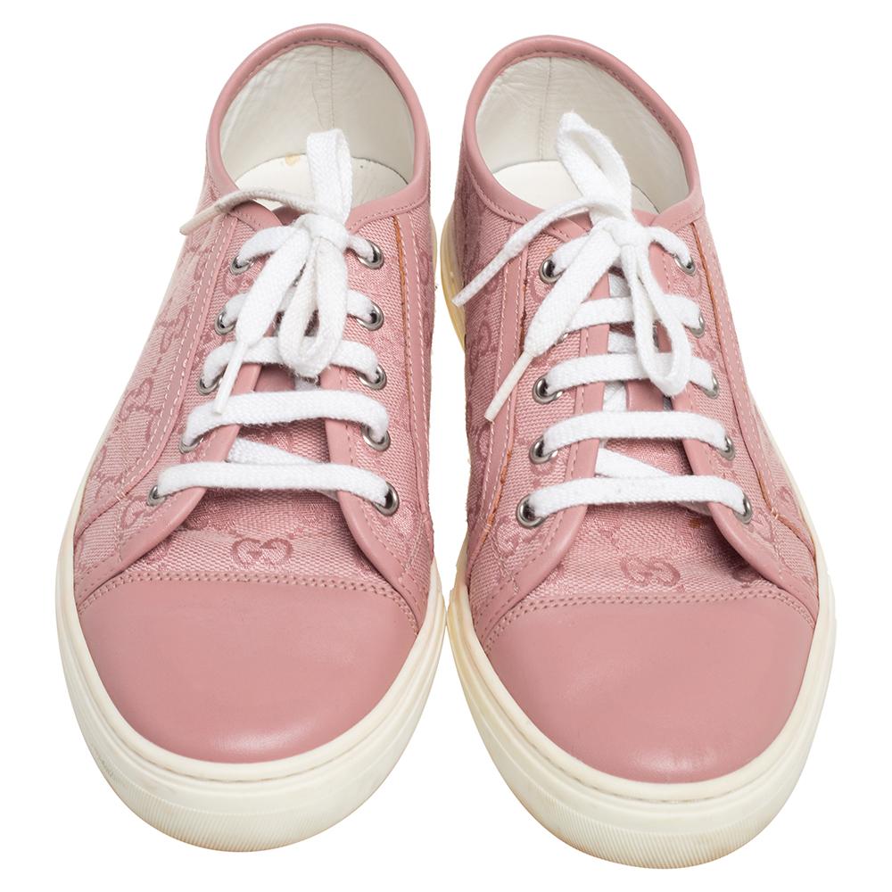These Gucci sneakers are simple yet stylish. They've been crafted from GG canvas as well as leather and designed with simple lace-ups. Set on rubber soles, these sneakers are just perfect to ace one's casual style.

