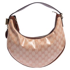 Bolso hobo Duchessa de lona recubierta de cristales GG rosa de Gucci