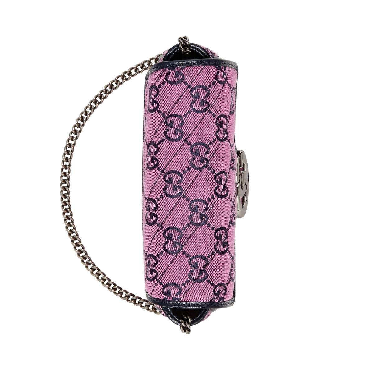 This GG Marmont super mini bag is part of the GG collection
Pink diagonal matelassé GG canvas
Black leather trim
Silver-toned hardware
Attached key ring that can attach to a separate bag
Double G
Chain shoulder strap with 60cm drop
Super mini size: